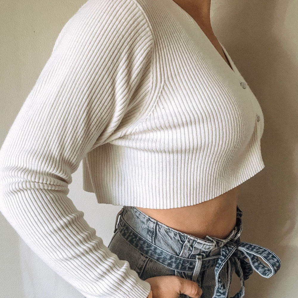 cropped knit sweater with shell buttons.